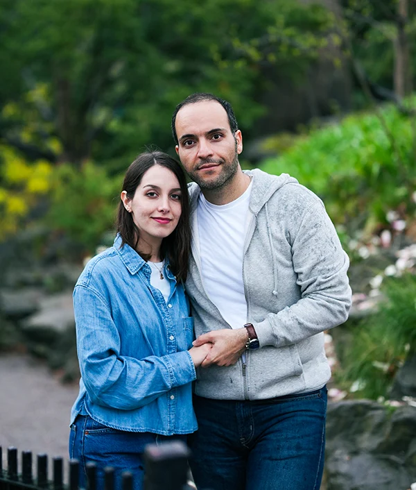 Couple embracing in a lush garden