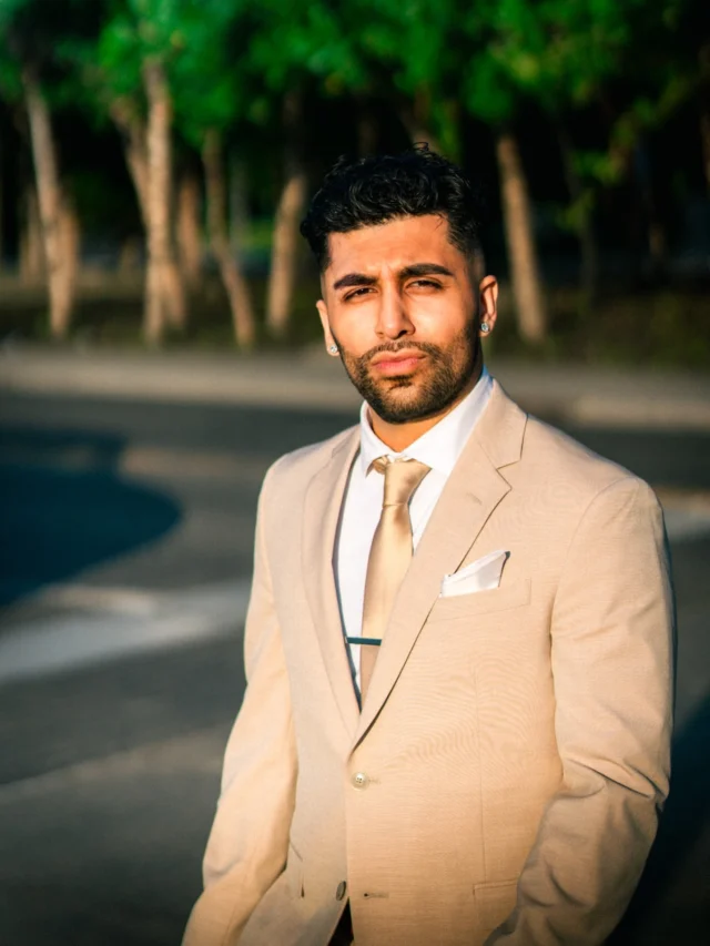 Mustafa in a beige suit at golden hour, Vaughan